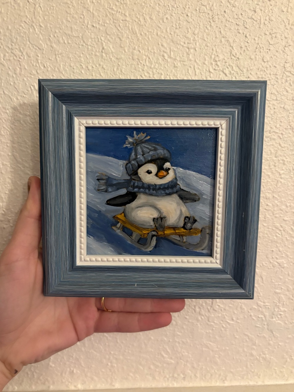 "Sledding Penguin” Original oil painting on wood board mini framed 4x4"